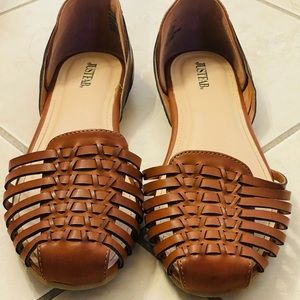 Lucita Woven Flat, cognac colored.
